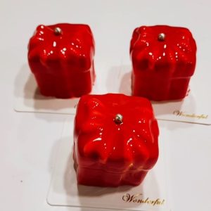 Set of 6 Festive Bento Christmas Tree Cakes by SilkyCakes, with jewel-colored Belgian chocolate and fruit filling.